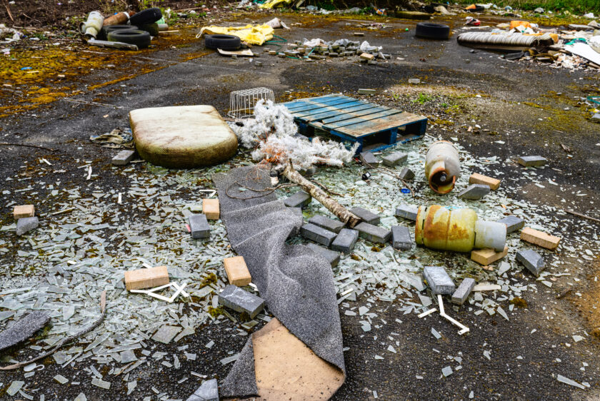 Rubbish dumped illegally by the road side.